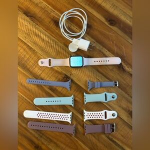 Apple Watch Series 6 with Pink, Purple, Mint, White, and Mauve Sport Bands